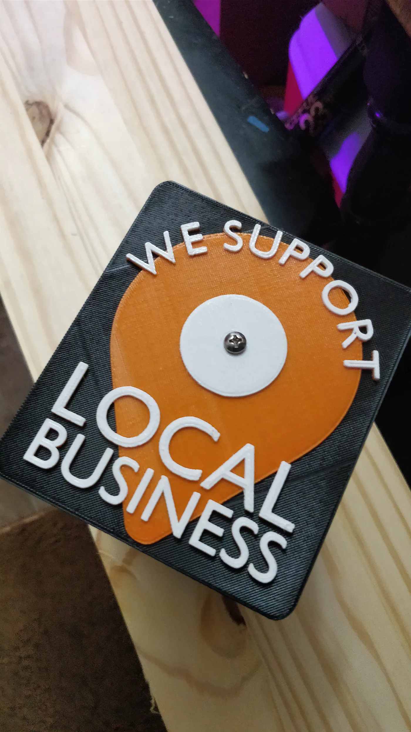 A 3D Printed License plate for a local business